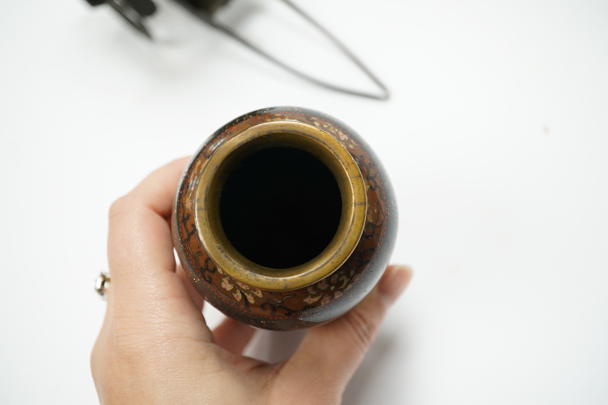 A damaged 19th century Japanese lacquer vase, a Japanese cloisonné enamel vase and a model tortoiseshell and lacquer rickshaw, rickshaw 20cm long., Condition - poor to fair